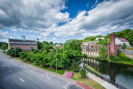View of Rotary Park and historic buildings along the Winnipesaukee River, in Laconia, New Hampshire.の写真素材