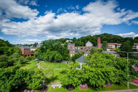 View of Rotary Park and historic buildings along the Winnipesaukee River, in Laconia, New Hampshire.の写真素材
