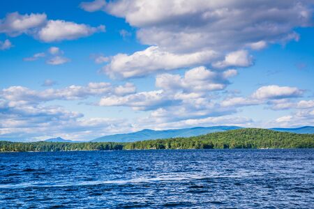 Mountain ranges and Lake Winnipesaukee in Weirs Beach, Laconia, New Hampshire.の写真素材