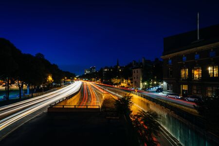 Long exposure of traffic along Storrow Drive at night, in Beacon Hill, Boston, Massachusetts.の写真素材