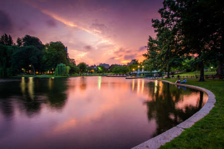 The lake at the Public Garden at sunset, in Boston, Massachusetts.の写真素材