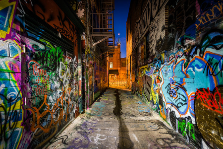 Graffiti Alley at night, in the Station North District, of Baltimore, Maryland.のeditorial素材