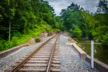Creek and railroad track in rural Carroll County, Maryland.の写真素材