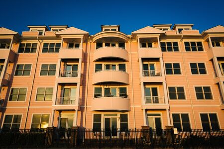 Pink condominium building in North Beach, Maryland.の写真素材