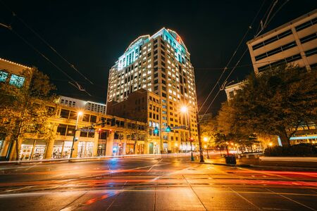 The intersection of City Hall Avenue and Monticello Avenue at night, in downtown Norfolk, Virginia.のeditorial素材