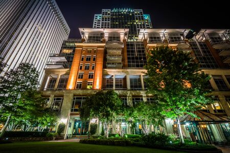 Buildings at The Green at night in Uptown Charlotte, North Carolina.の写真素材