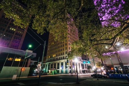 Buildings and intersection at night, in Mobile, Alabama.のeditorial素材