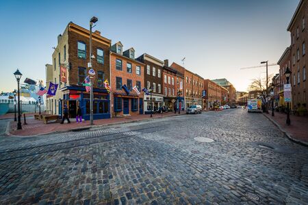 Thames Street, a cobblestone street in Fells Point, Baltimore, Maryland.のeditorial素材