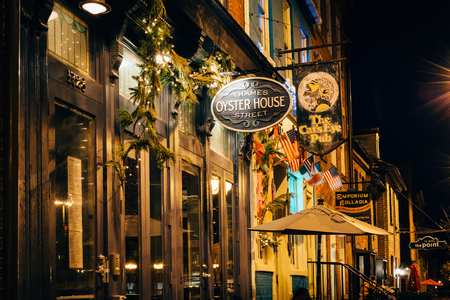 Businesses along Thames Street, in Baltimore, Maryland.のeditorial素材