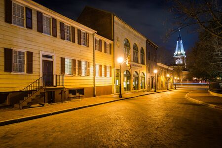 Buildings on School Street and St. Anne's Parish at night, in Annapolis, Maryland.のeditorial素材