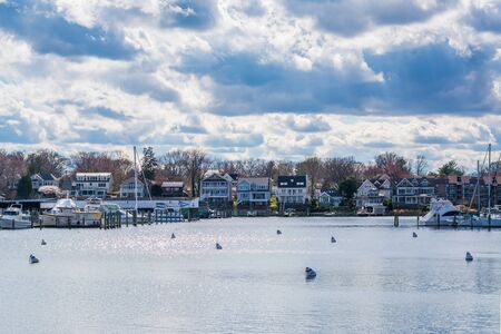 Houses and boats docked on Spa Creek, in Annapolis, Maryland.のeditorial素材