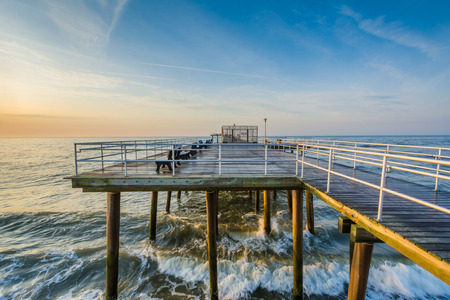 The fishing pier at sunrise in Ventnor City, New Jersey.の写真素材