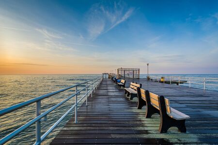 The fishing pier at sunrise in Ventnor City, New Jersey.の写真素材