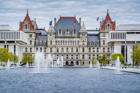 Fountains and the exterior of the New York State Capitol, in Albany, New York.の写真素材