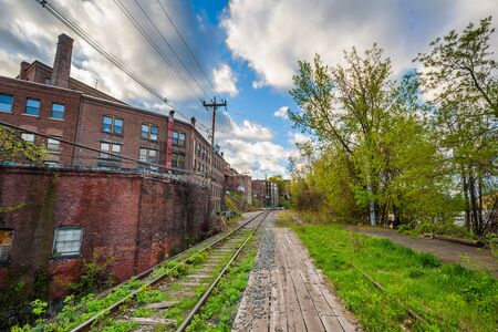 Railroad tracks and old buildings in Brattleboro, Vermont.の写真素材