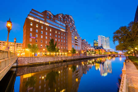 Buildings along the waterfront at night, in the Inner Harbor of Baltimore, Maryland.のeditorial素材