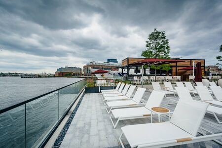 The pool area of the Sagamore Pendry Hotel in Fells Point, Baltimore, Maryland.の写真素材