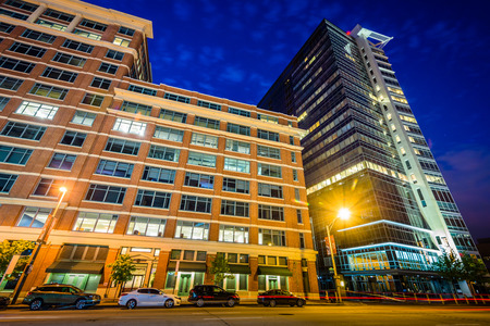 Modern buildings along Pratt Street at night, in Baltimore, Maryland.のeditorial素材
