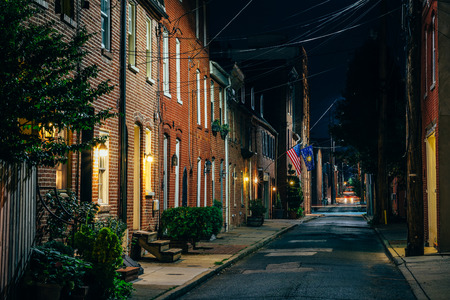Row houses on Bethel Street at night, in Fells Point, Baltimore, Marylandのeditorial素材