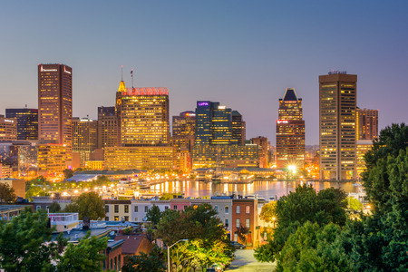 View of the Inner Harbor skyline at night, in Baltimore, Maryland