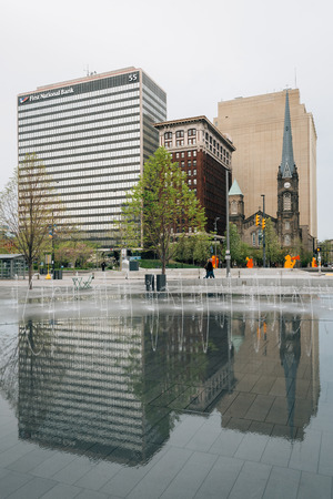 Buildings in downtown reflecting at Public Square, in Cleveland, Ohioのeditorial素材
