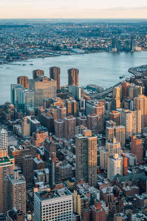 View of buildings in Midtown Manhattan and the East River in New York Cityのeditorial素材