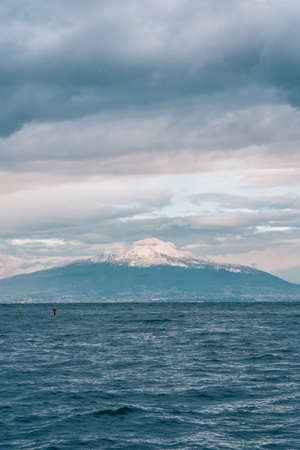 Mount Vesuvius covered in snow, seen from Sorrento, Italyの写真素材