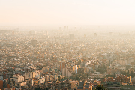 Sunset cityscape skyline view from Bunkers Del Carmel, in Barcelona, Spainの写真素材