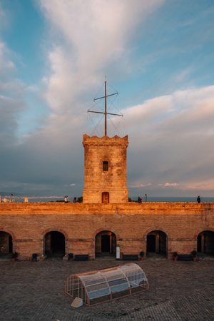 Sunset light on Montjuic Castle, in Barcelona, Spainの写真素材
