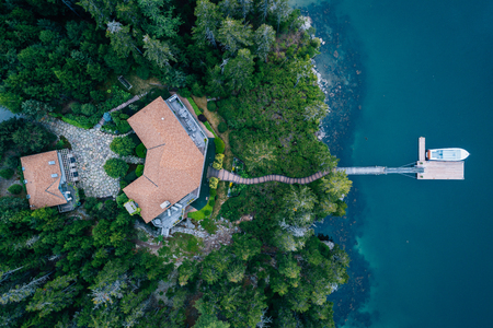 View of a house and dock in Northeast Harbor, Maineの写真素材