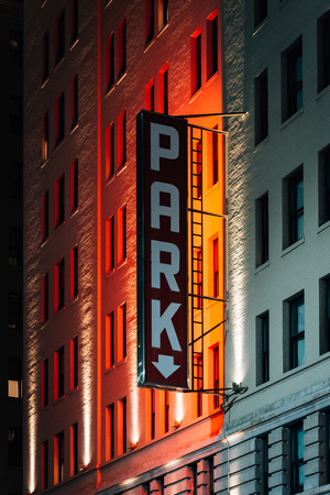 Parking sign at night, in Midtown Manhattan, New York Cityのeditorial素材