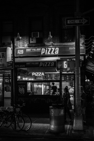 East Village Pizza at night, in the East Village, Manhattan, New York Cityのeditorial素材