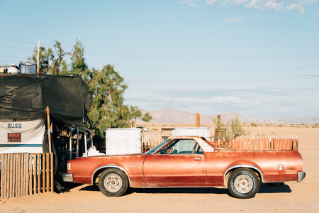 An old abandoned car in Slab City, Californiaの写真素材