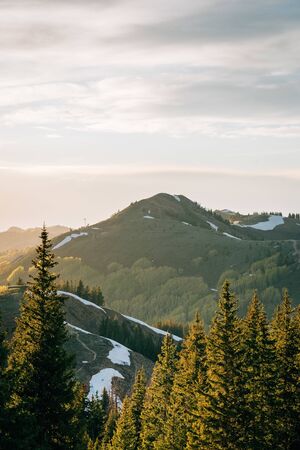 View of mountains in the Wasatch Range of the Rocky Mountains at sunset, from Guardman's Pass, near Park City, Utahの写真素材