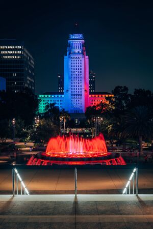 Fountains at Grand Park, and City Hall at night, in downtown Los Angeles, Californiaの写真素材