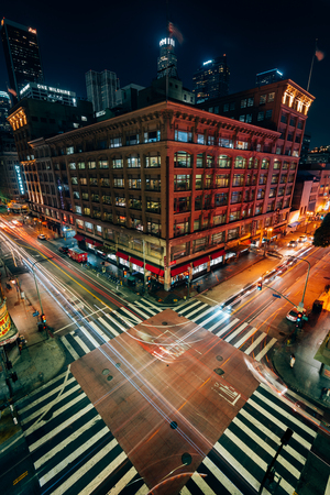 Cityscape night view of an intersection on Broadway in downtown Los Angeles, Californiaのeditorial素材