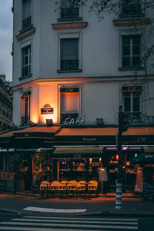 A cafe with neon sign in Paris, Franceのeditorial素材