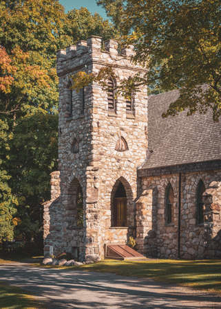 A stone building with a large arched doorway -Cragsmoor Stone Church, Cragsmoor, New Yorkの写真素材