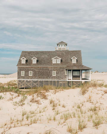 Oregon Inlet Lifesaving Station with sandy dunes, in the Outer Banks, North Carolinaのeditorial素材