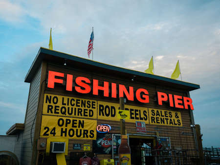 Fishing pier sign in Ocean City, Marylandの写真素材