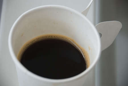 Black coffee in the paper cup.の写真素材