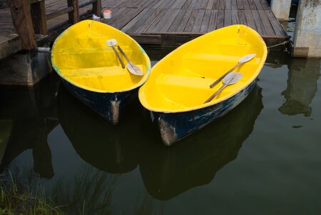 Yellow boat in the pond of the park, Bangkok.の写真素材