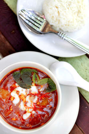 Thai food Spicy muslim curry with chicken serve with steam riceの写真素材