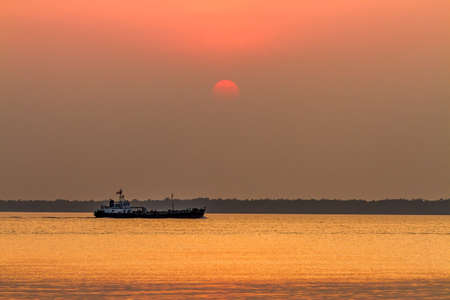 Boat at sunsetの写真素材