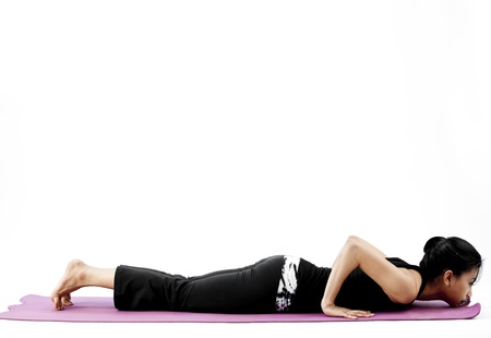Thai Woman stretching with a yoga pose - Catura  7749;ga Da  7751;  7693;  257;sana Poseの写真素材