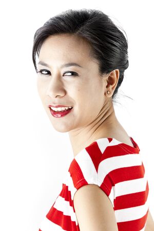 Portrait of young asian woman in red stripes dressの写真素材