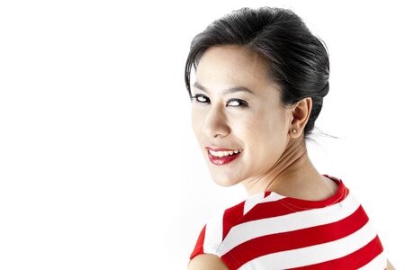 Portrait of young asian woman in red stripes dressの写真素材