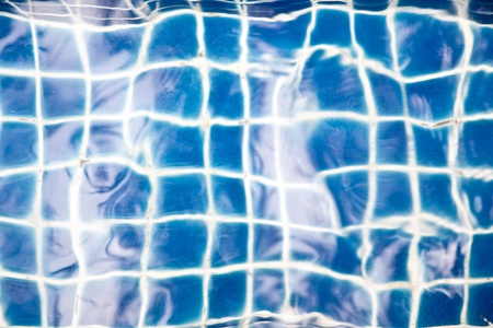 Blue tiles in the swimming poolの写真素材