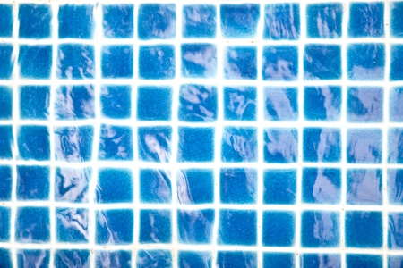 Blue tiles in the swimming poolの写真素材