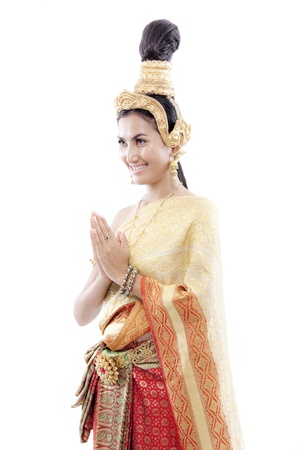 Thai woman greets with her thai costume の写真素材